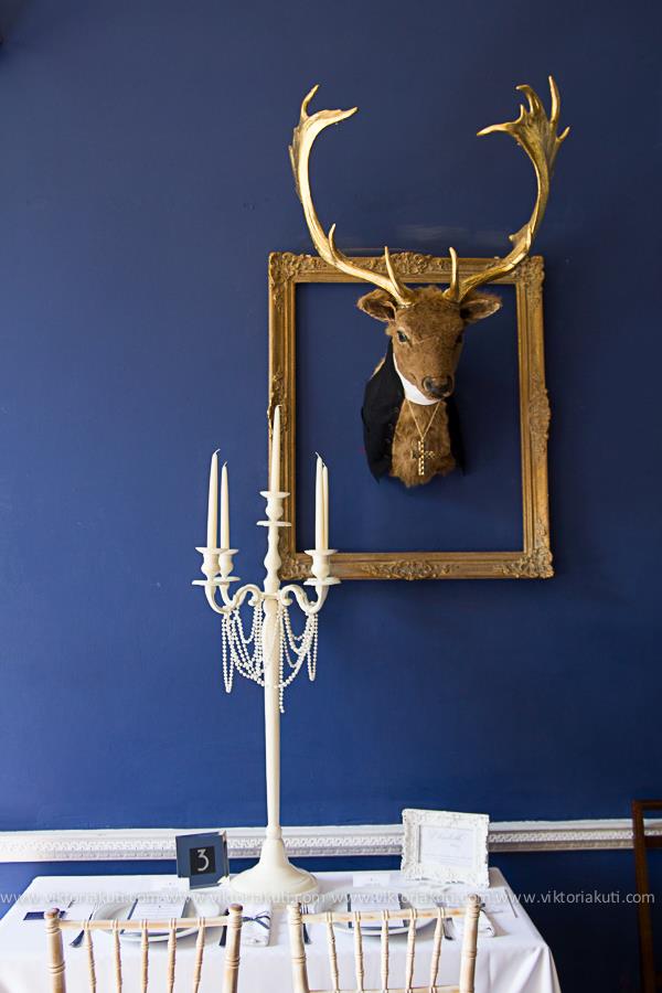 Ivory candelabra strung with pearls